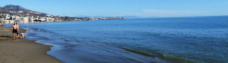 Family on Los Boliches beach in Fuengirola, Spain - Photo copyright Anne Sewell